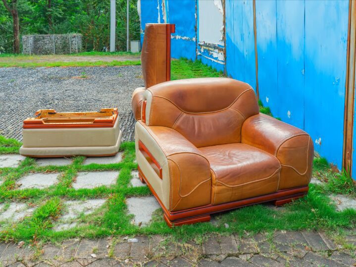 old sofa placed out side home 